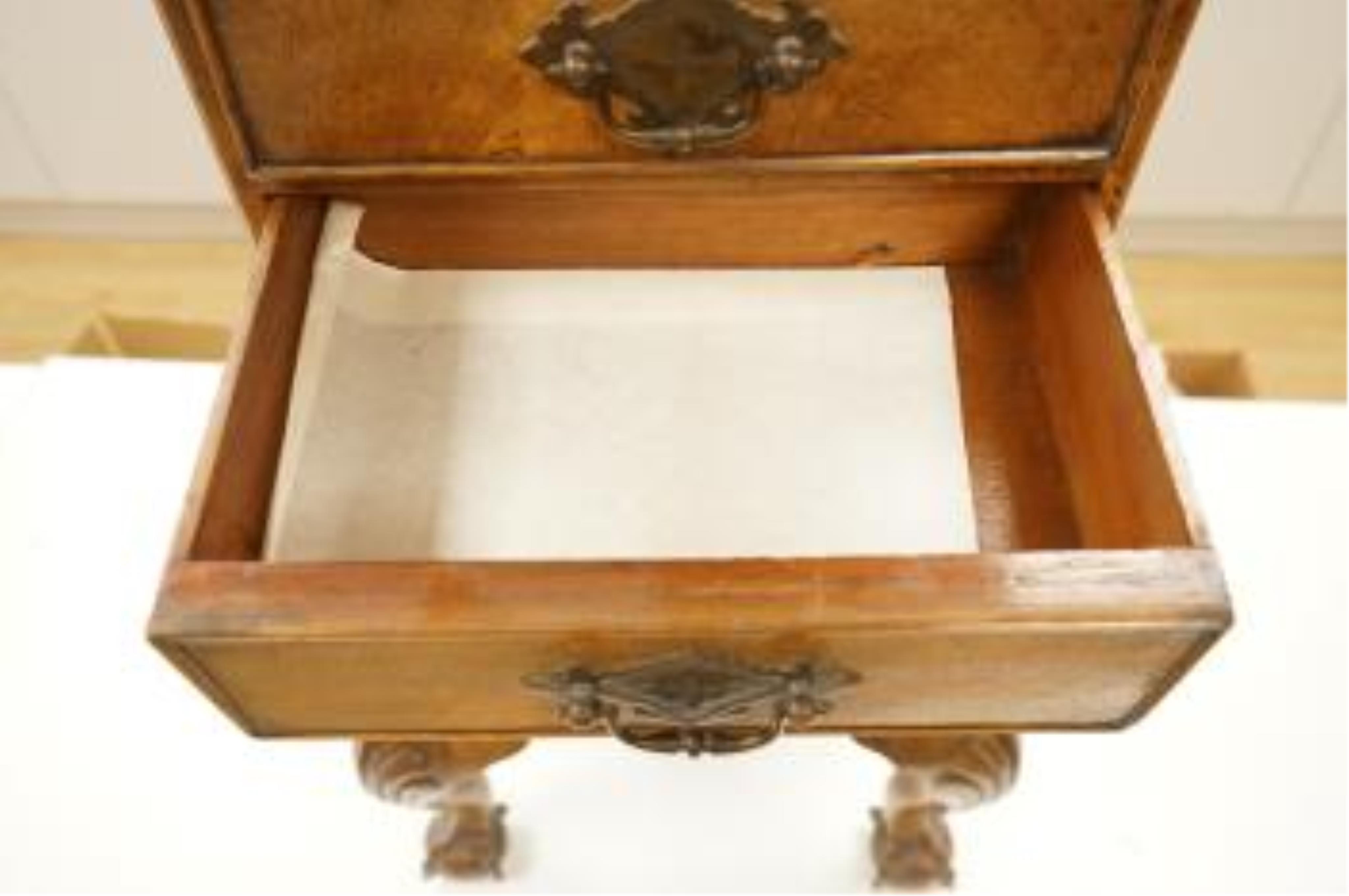 An early 20th century miniature walnut four drawer chest, 67cm